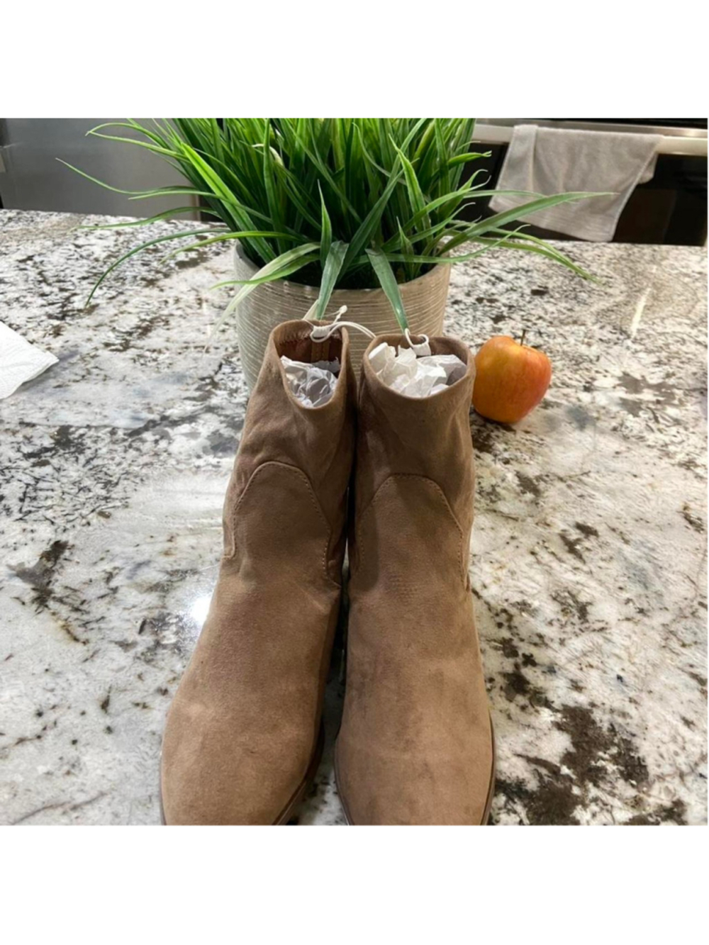 Tan suede ankle boots with a 2